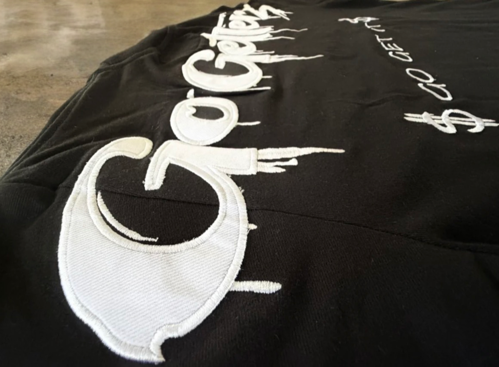 GO GET IT. T-SHIRT
